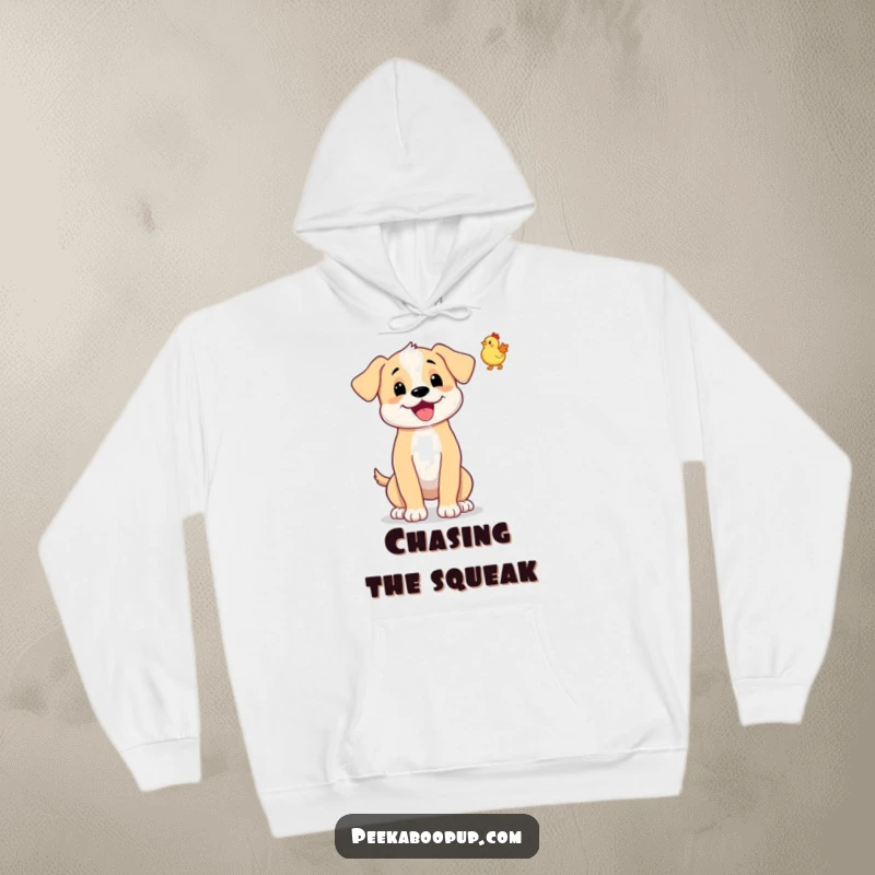 Funny hoodie with a happy, wagging puppy tossing a tiny rubber chicken. Ideal for cozy fun.
